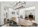 Bright dining area with open floor plan, great for entertaining, and easy access to kitchen and living spaces at 4944 Dovecote Trl, Suwanee, GA 30024