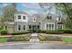 Beautiful clubhouse exterior featuring stone accents, manicured landscaping, and a welcoming entrance at 4944 Dovecote Trl, Suwanee, GA 30024