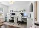 Bright office space with two desks, gaming chairs, and natural light from the window at 4944 Dovecote Trl, Suwanee, GA 30024