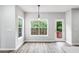 Charming breakfast nook with views of the backyard, perfect for enjoying morning coffee and meals at 980 Charter Club Dr, Lawrenceville, GA 30043