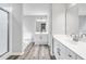 This main bathroom has a double vanity, bathtub, and a shower at 980 Charter Club Dr, Lawrenceville, GA 30043