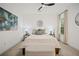 Minimalist bedroom design featuring neutral tones, a queen-size bed, and art for a calm and restful atmosphere at 1059 Rockford Township Sw Dr, Marietta, GA 30064