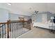 A bedroom featuring soft blue walls, a ceiling fan, and natural light at 1059 Rockford Township Sw Dr, Marietta, GA 30064