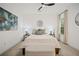 Bedroom with carpet, large window and accent wall art at 1059 Rockford Township Sw Dr, Marietta, GA 30064