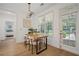 Cozy breakfast nook filled with light with modern table, chairs and view to the exterior at 1059 Rockford Township Sw Dr, Marietta, GA 30064