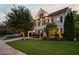Charming two-story home featuring a lush green lawn, mature landscaping, and classic black shutters at 1059 Rockford Township Sw Dr, Marietta, GA 30064