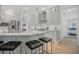 Bright kitchen with stainless steel appliances, marble countertops, and breakfast bar with seating at 1059 Rockford Township Sw Dr, Marietta, GA 30064