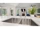 Gourmet kitchen sink and countertops provide an elegant space for culinary endeavors at 1059 Rockford Township Sw Dr, Marietta, GA 30064