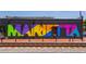 Image of colorful Marietta mural adjacent to train tracks at 1059 Rockford Township Sw Dr, Marietta, GA 30064