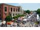 Lively street view bustling with people, tents, and vendors at 1059 Rockford Township Sw Dr, Marietta, GA 30064
