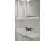 White bathroom sink with a silver faucet, and matching vanity mirrors at 4102 Barr Cir, Tucker, GA 30084