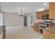 Open concept kitchen featuring stainless steel appliances, granite countertops, and tile flooring at 4102 Barr Cir, Tucker, GA 30084