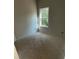 Unfinished bedroom with one window providing natural light into the room at 543 Courthouse Park Dr, Temple, GA 30179