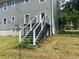 Backyard featuring stairs that leads to a door on the second story at 841 N North Price Rd, Sugar Hill, GA 30518