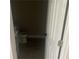 Powder room featuring a ceramic toilet and tile floor at 841 N North Price Rd, Sugar Hill, GA 30518