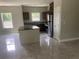 Open kitchen featuring stainless steel appliances and large island at 841 N North Price Rd, Sugar Hill, GA 30518
