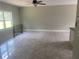 Living room featuring tile floors, fresh paint, and a bright window at 841 N North Price Rd, Sugar Hill, GA 30518