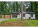Beautiful home boasts a freshly painted exterior, modern windows, and a well-maintained lawn at 1719 San Gabriel Ave, Decatur, GA 30032
