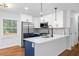 Modern kitchen featuring stainless steel appliances, sleek countertops, and stylish cabinetry at 1719 San Gabriel Ave, Decatur, GA 30032