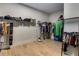 Large walk-in closet with organized hanging and shelving space at 4960 Iris St, Cumming, GA 30040