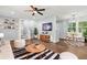 Spacious living room with hardwood flooring, neutral walls, and stylish furniture at 4981 Crowe Se Dr, Smyrna, GA 30082