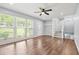 Light-filled living room featuring hardwood floors and ample natural light at 4981 Crowe Se Dr, Smyrna, GA 30082