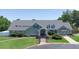 Charming clubhouse exterior with manicured lawn and inviting entrance at 6765 Creek View Ln, Cumming, GA 30041