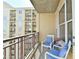 Cozy balcony with seating offers an intimate outdoor space at 1101 Juniper Ne St # 922, Atlanta, GA 30309
