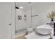 Modern bathroom featuring a sleek vanity, toilet, and stylish shower with unique tile work at 1101 Juniper Ne St # 922, Atlanta, GA 30309