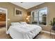 Comfortable bedroom with hardwood floors, a large window, and a view at 1101 Juniper Ne St # 922, Atlanta, GA 30309