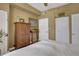 Bedroom with bright window and wood cabinet, plus wood floors at 1101 Juniper Ne St # 922, Atlanta, GA 30309