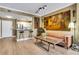 Bright living room with bar seating, stainless steel appliances, and neutral paint at 1101 Juniper Ne St # 922, Atlanta, GA 30309
