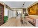 Bright living room with bar seating, stainless steel appliances, and neutral paint at 1101 Juniper Ne St # 922, Atlanta, GA 30309