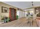 Inviting living room featuring hardwood floors, modern lighting, and a bar with seating near the kitchen at 1101 Juniper Ne St # 922, Atlanta, GA 30309
