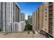 Exterior view of parking lot and surrounding buildings at 1101 Juniper Ne St # 922, Atlanta, GA 30309