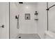 Updated bathroom with a black-and-white tiled shower and modern fixtures at 1101 Juniper Ne St # 922, Atlanta, GA 30309
