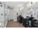 Modern bathroom with double sink vanity, frameless glass shower, and sleek fixtures at 112 Rotherhithe Nw Ln, Marietta, GA 30066