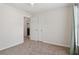 Neutral bedroom featuring a ceiling fan, a closet, and natural light at 112 Rotherhithe Nw Ln, Marietta, GA 30066