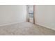Bright bedroom featuring neutral carpet and a window with light-filtering curtains at 112 Rotherhithe Nw Ln, Marietta, GA 30066