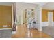 Inviting foyer with gleaming hardwood floors and elegant staircase makes a great first impression at 112 Rotherhithe Nw Ln, Marietta, GA 30066