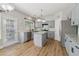 Well-lit kitchen with gray cabinetry, granite counters, stainless steel appliances and a door to the outside at 112 Rotherhithe Nw Ln, Marietta, GA 30066