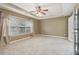 Large main bedroom with a ceiling fan and a window with natural lighting at 112 Rotherhithe Nw Ln, Marietta, GA 30066