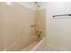 Clean bathroom with a shower-tub combo and neutral-toned walls at 335 Whisper Way, Dacula, GA 30019