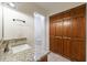 Bathroom with granite countertop vanity and wood cabinets at 335 Whisper Way, Dacula, GA 30019