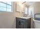 Bathroom featuring a sleek vanity, a marble countertop, and modern fixtures at 3497 Mount Vernon Cir, Atlanta, GA 30340