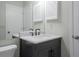 Bathroom featuring a sleek vanity, a marble countertop, and modern fixtures at 3497 Mount Vernon Cir, Atlanta, GA 30340