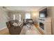 Comfortable living room featuring fireplace, soft rug, and stylish decor at 3497 Mount Vernon Cir, Atlanta, GA 30340