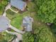 This aerial view showcases the home's roof, mature landscaping, and circular driveway at 992 Marbury Sw Ct, Marietta, GA 30064