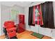 Basement features a vintage barber chair, a Coca-Cola refrigerator, and an Atlanta United banner at 992 Marbury Sw Ct, Marietta, GA 30064