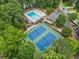 Aerial shot of community amenities, including a pool, tennis courts, and well-maintained landscaping at 992 Marbury Sw Ct, Marietta, GA 30064